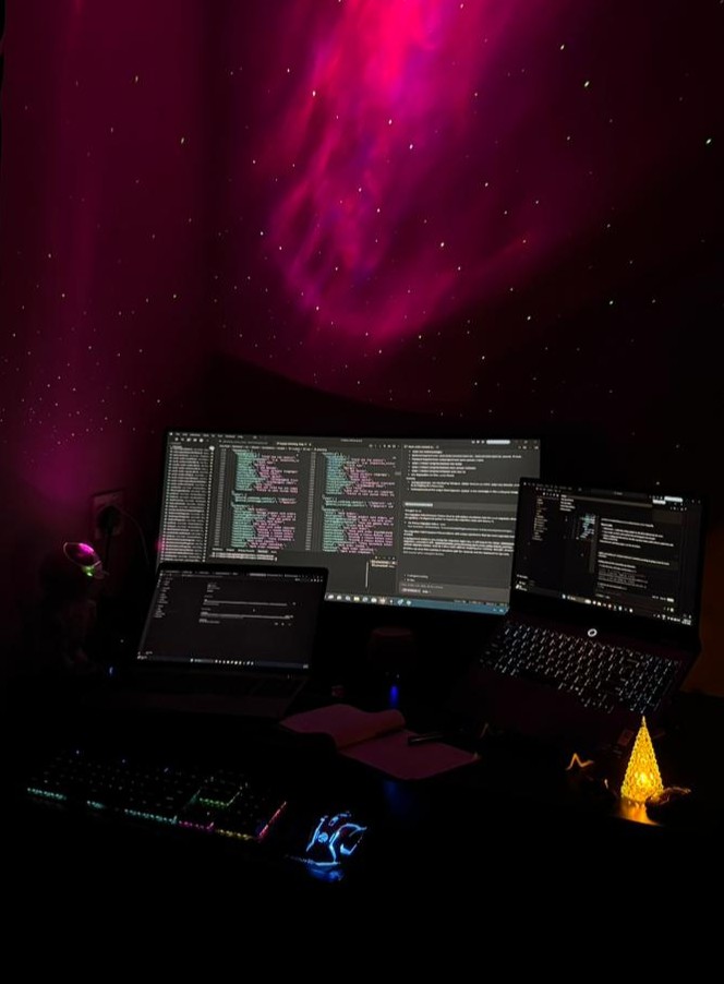 My developer workstation with dual monitors and coding setup
